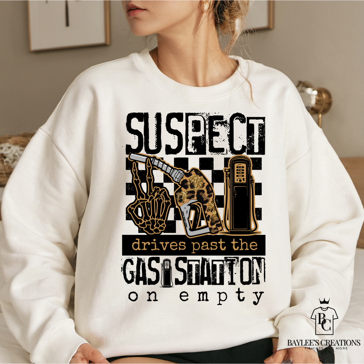 Suspect Drives Past the Gas Station on Empty - Women's Sweatshirt printed apparel by Baylees Creations