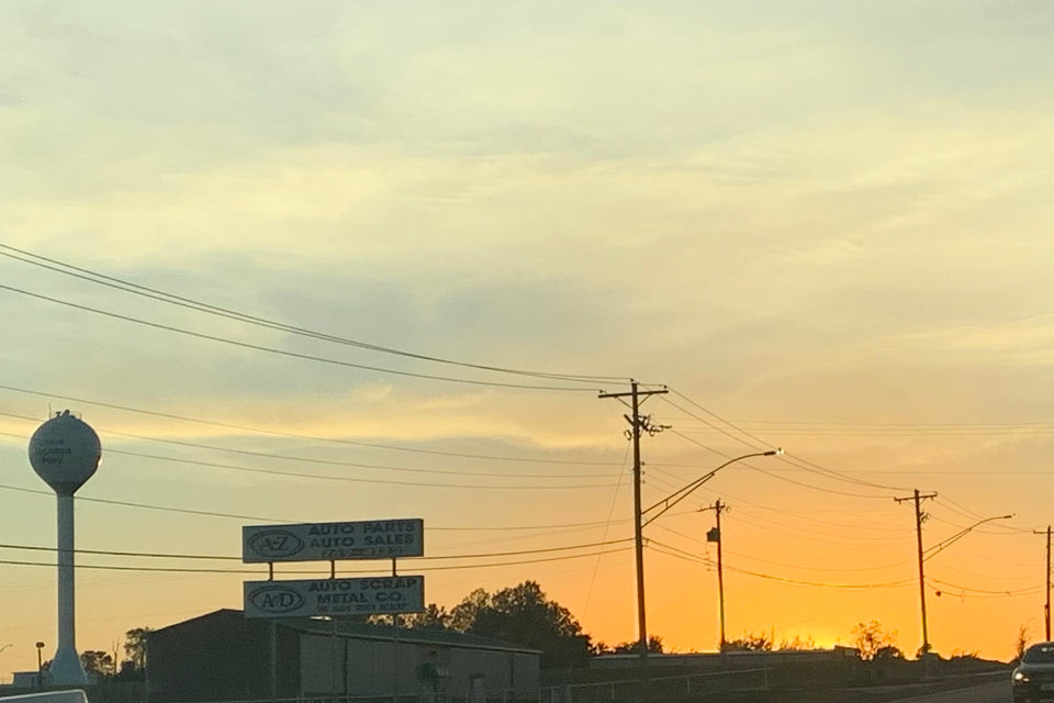 Nicoma Park water tower at sunset